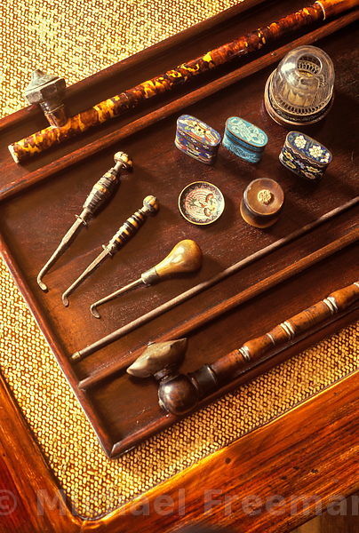 Two opium pipes on a tray